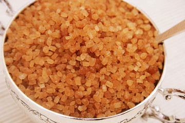 Brown sugar in sugar bowl.