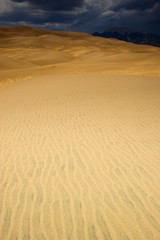 Thunderstorm over sand dunes
