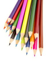 Colored pencils on white background