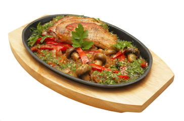 Roastpig with vegetables and mushrooms