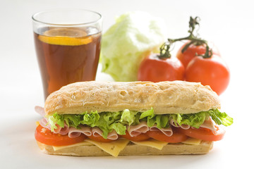delicious sandwich of ham cheese lettuce tomato