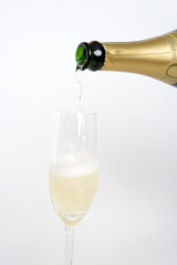 Fototapeta premium filling a glass with champagne