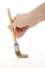 using a paintbrush