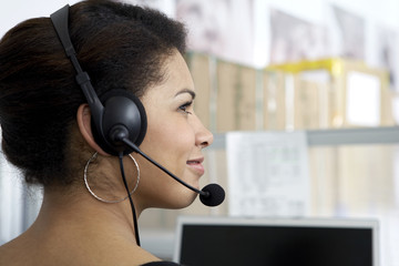 Businesswoman talking on headset