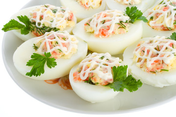 close-up stuffed eggs with red fish