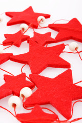 felt holiday red stars isolated on the white