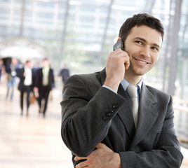 Businessman calling on phone