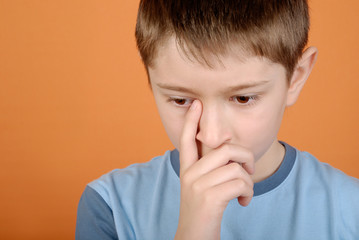 Boy thinks