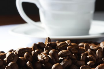 Cup with coffee, costing on coffee grain © fox17