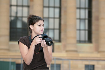 woman taking photos