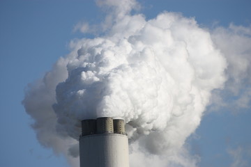 Close up of White Smoke from a Power Station Chimney.