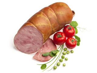 Boiled sausage decorated with tomatoes, onion and pea