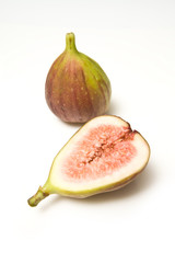 Fresh figs isolated on a white studio background.