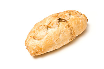 Cornish pasty isolated on a white studio background.