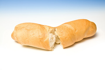 French loaf or stick on a graduated blue studio background.