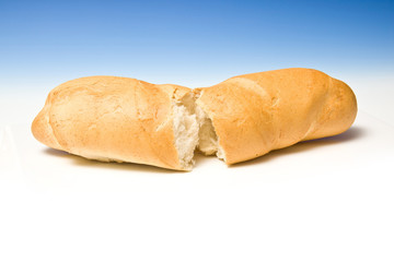 French loaf or stick on a graduated blue studio background.