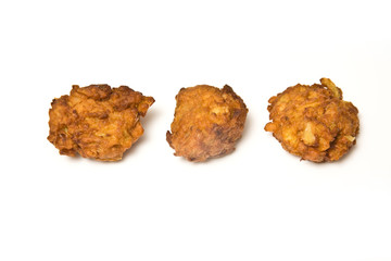 Onion Bhaji's isolated on a white studio background.