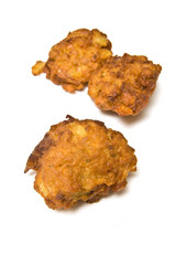 Onion Bhaji's isolated on a white studio background.