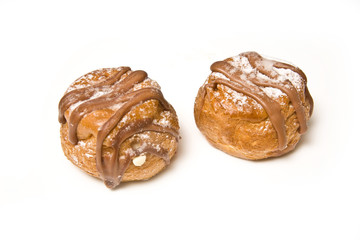 Cream buns isolated on a white studio background.