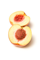 Nectarines isolated on a white studio background.