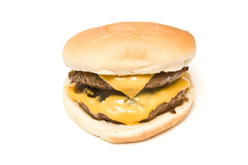 Cheeseburger isolated on a white studio background.