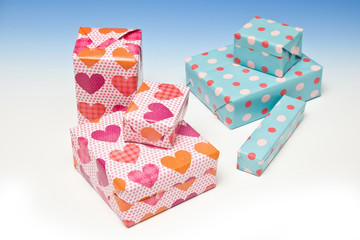 Presents or gift's on a graduated blue studio background.