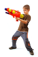 Young boy with water gun - 12553215