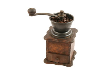 wooden coffee grinder isolated close up in studio