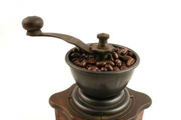 wooden coffee grinder isolated close up in studio