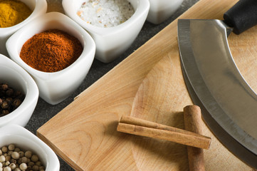 cutting knife with pots of spices