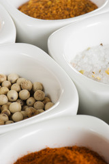 view over several pots with ground spices
