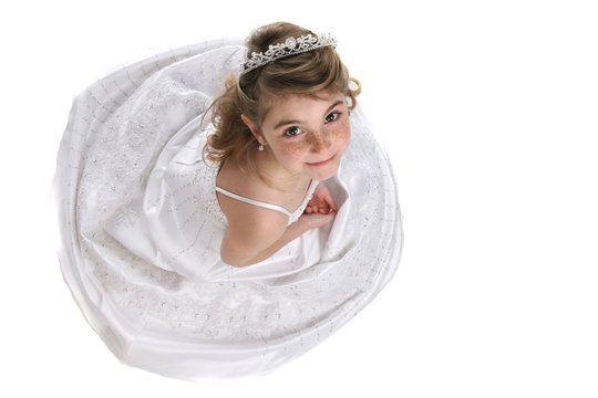 Cute Girl In Tiara And White Formal Gown As Seen From Above