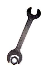 Wrench and nut on white