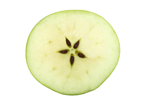 Half Of A Green Apple With Five Seeds