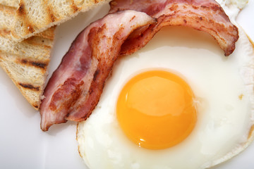 Breakfast - toasts, eggs, bacon