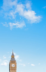 Fototapeta na wymiar Big Ben, Westminster, London, blue sky, clouds and moon
