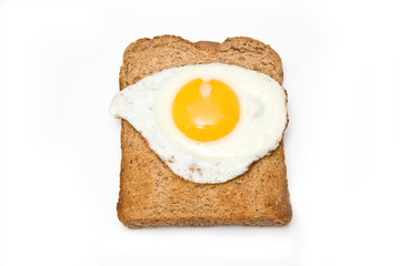Fried egg ion toast isolated on a white studio background.