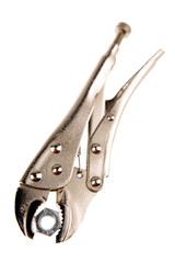 Pliers and nut isolated on white background