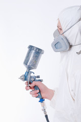 Worker with airbrush gun