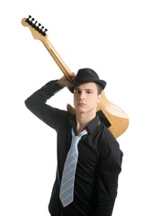 young sexy male guitar player, tie and black hat