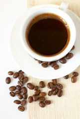 Cup of coffee and beans