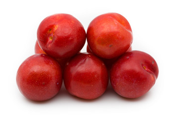 A group of prunes isolated on white