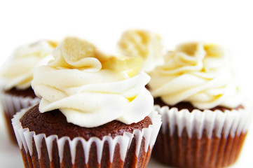 Fancy gourmet chocolate cupcakes, isolated on white