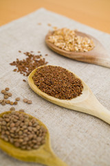spoons, grain and legumes