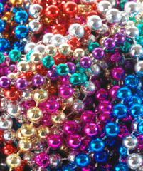 closeup of Mardi Gras beads