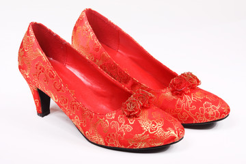 Red high-heeled shoes with Chinese designs