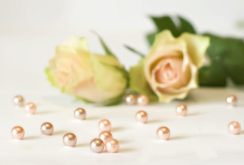 Pink pearls with two roses