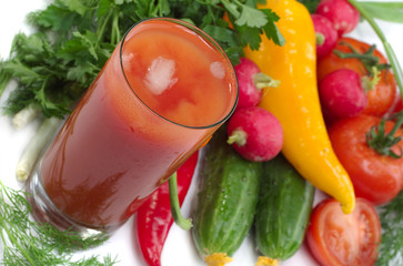 Fresh vegetables and glass of tomato juice