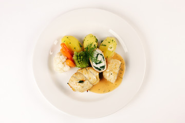 Schollenröllchen mit Mozzarella und Spinat gefüllt