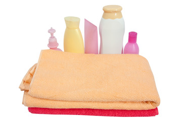 Obraz na płótnie Canvas Toiletries with pink towel